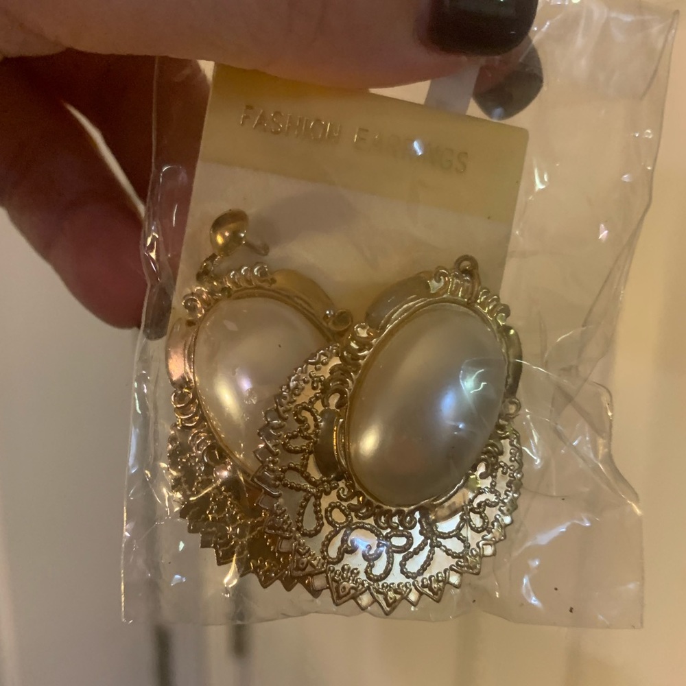 Faux pearl and gold statement earrings